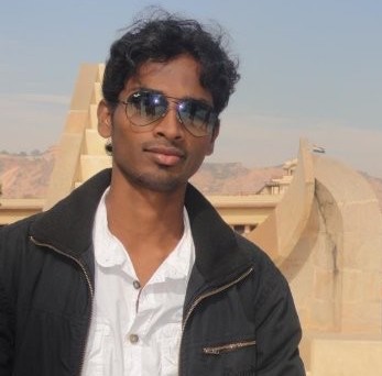 Author Shahrukh in front of a monument